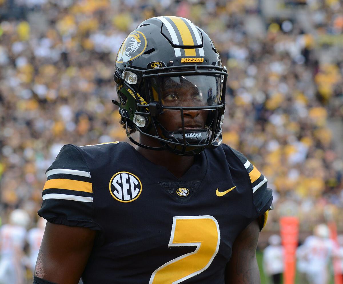 Ennis Rakestraw Jr. walks off the field Saturday on Faurot Field at