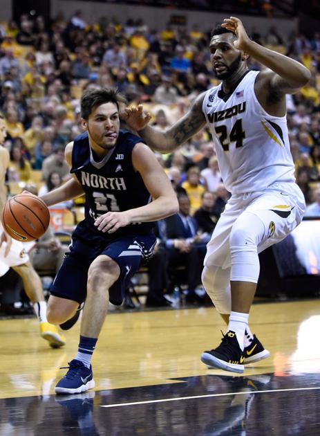 Ivan Gandia Rosa Takes The Ball To The Basket Photos