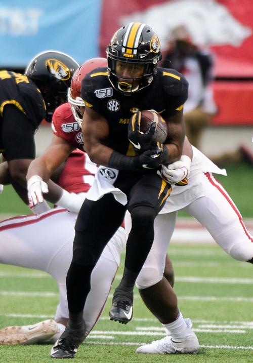 Tyler Badie makes a run