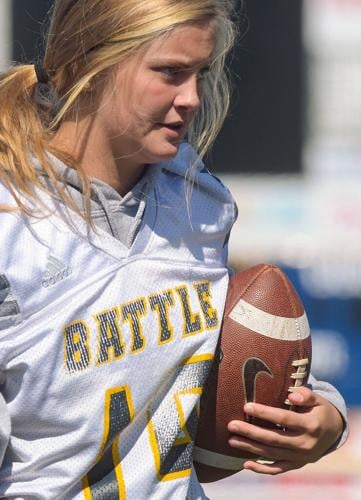 Sam Schupp gathers footballs