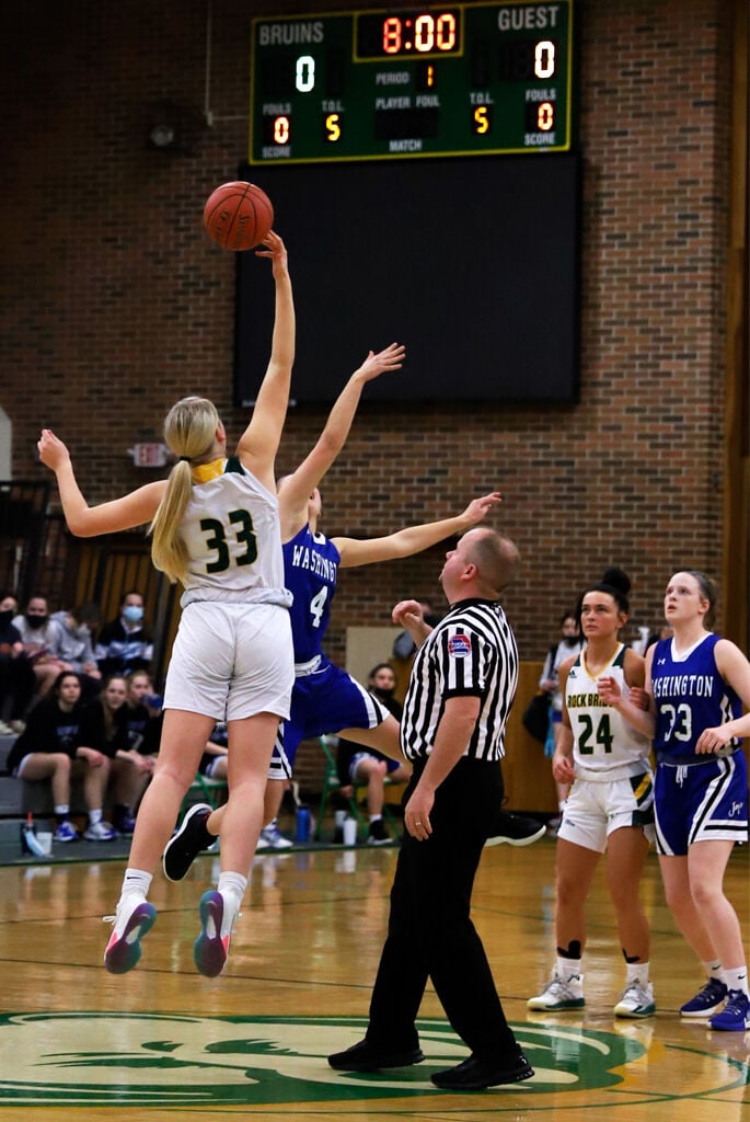 Rock Bridge High School junior Kyrah Brodie reaches for the ball