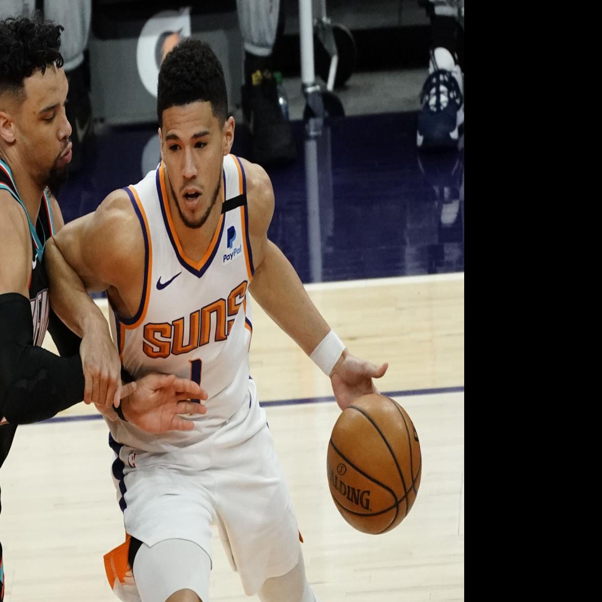 Devin Booker, Chris Paul combine for 60 as Suns hold off short-handed Jazz