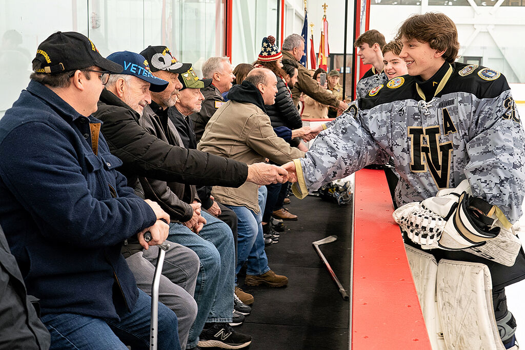 Luke  Military members participate Salute to Service game at