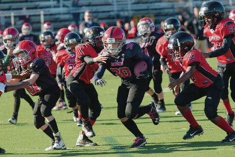 Junior Ravens football team proves looks can be deceiving