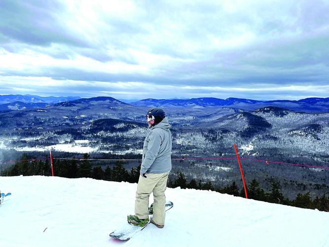 Nordic Tracks - Black Mountain - snowboarder on summit