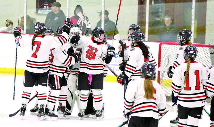KHS Girls Hockey - team celebrates playoff win