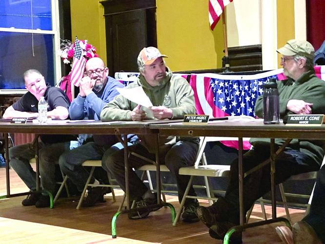 Milan Selectman Randy Fortin (in orange-trimmed cap)