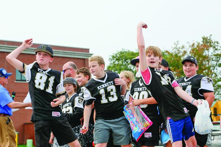 09-06-25 Mud Bowl Parade football tossing candy