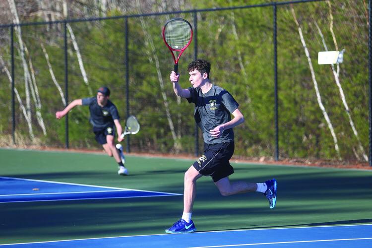 04-08-26 KHS BTennis todorov after swing
