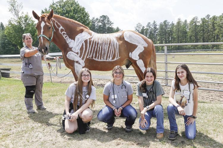 07-19-22 Vet Camp smiling with horse