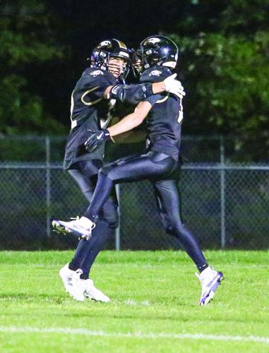 09-12-25 KHS FB robertson hug after td