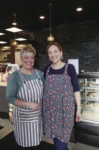 12-19-22 Station Bistro owners vertical