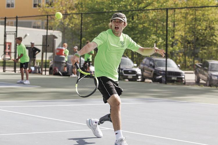 05-17-22 KHS Boys Tennis c bailey mid swing