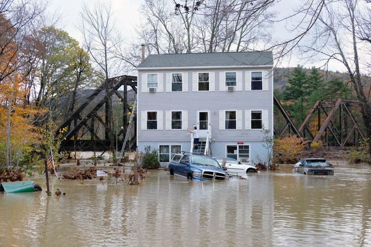 10-30-17 Flooded house Glen rsident on stairs.jpg