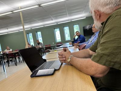 Participants with the Berlin Youth Prevention Coalition discuss programs