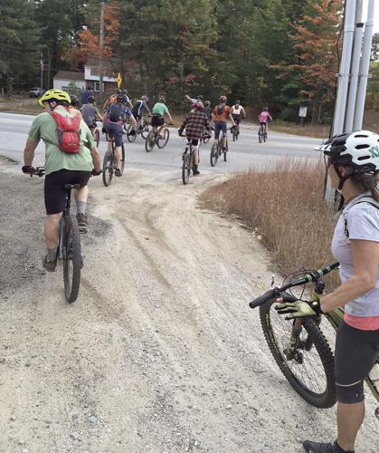 Wheel Family Fun - KHS Mt. Bike team crossing Route 302