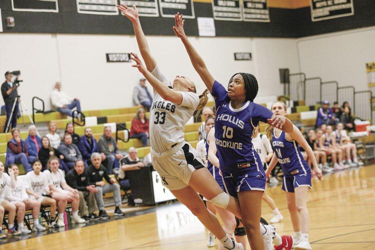 03-11-23 KHS WBB Playoffs chick shot tighter