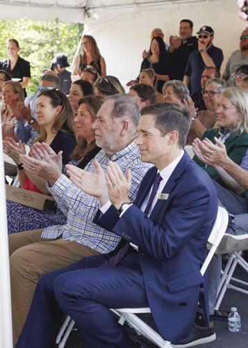 09-17-24 River Turn Apts applauding vertical