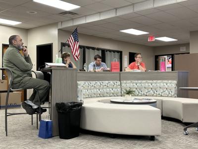 Berlin school board members listen to teachers and administrators at the June 5 meeting