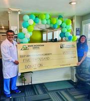 White Mountain Dental celebrates 10 years of care with community giving