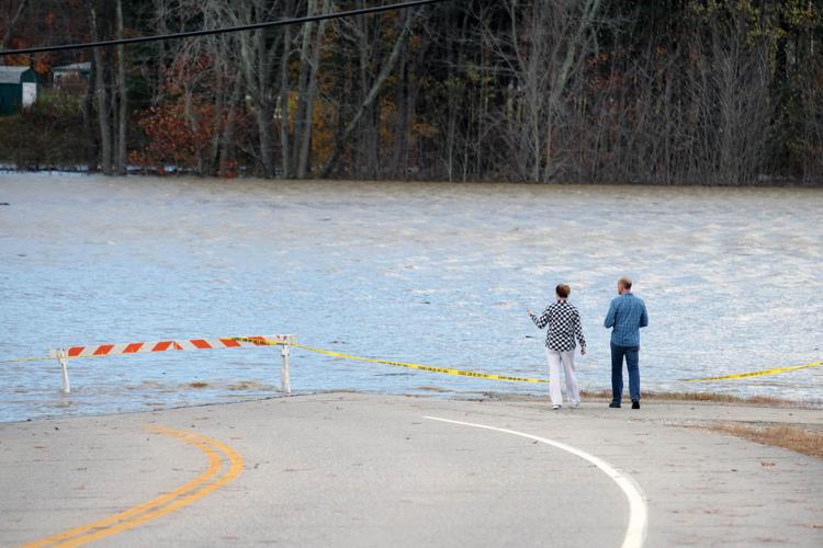 flood_couple looking at west side road.jpg
