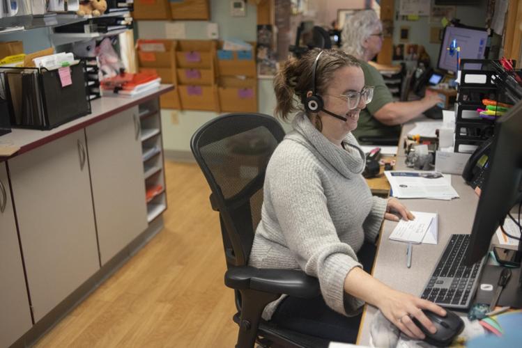 Team coordinator Shannon Young speaks with a patient over the phone