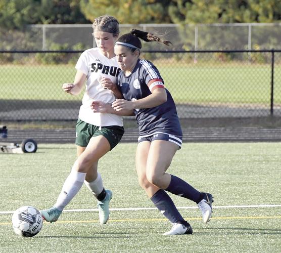 FA girls soccer - Juliana Pacini tackle