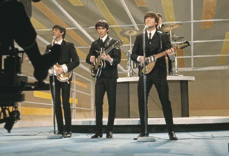 The_Beatles_performing_at_The_Ed_Sullivan_Show_(cropped_2).jpg