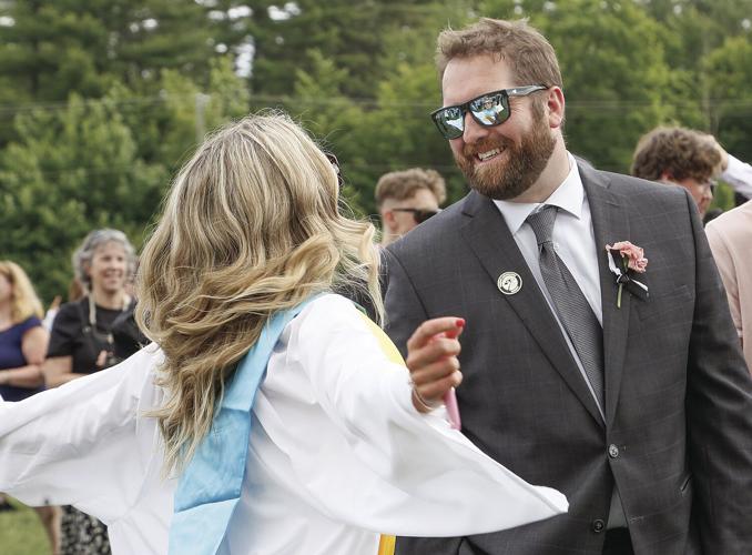 06-08-24 KHS Grad walker and carpenter