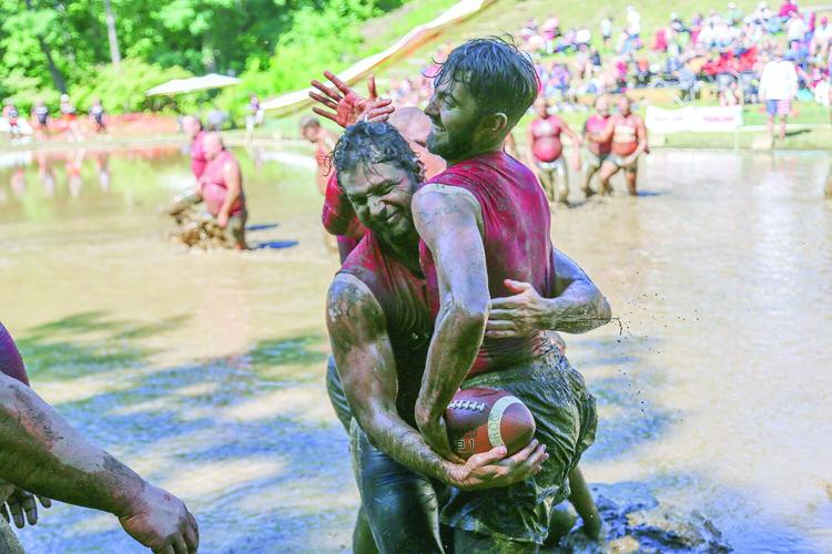 09-12-26 Mud Bowl crocs hug 1