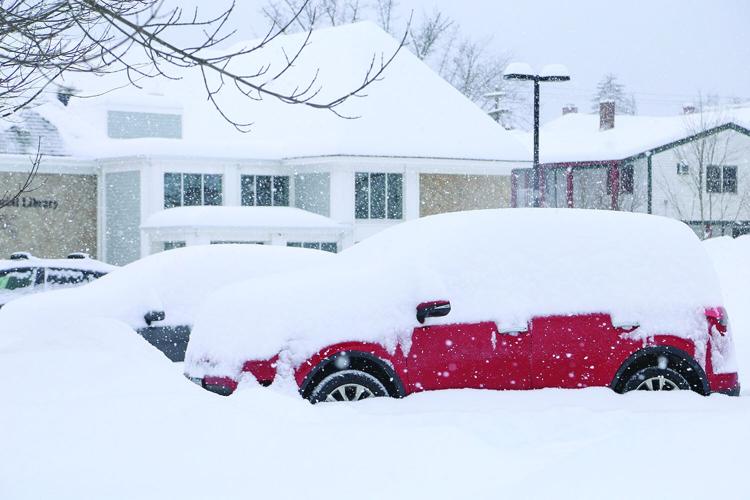 01-26-25 Snowstorm buried cars library