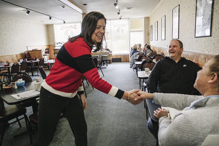 01-20-24 Ayotte at Bea's shaking hands diner
