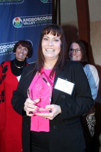 Greetings Jeweler president Kelli Poulin (center) accepts the Lifetime Achievement Award