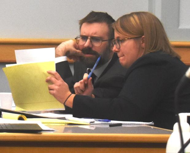 Dustin Duren confers with defense attorney Margaret Kettles