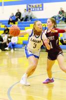 Lakers turn up defensive intensity, rally for first win