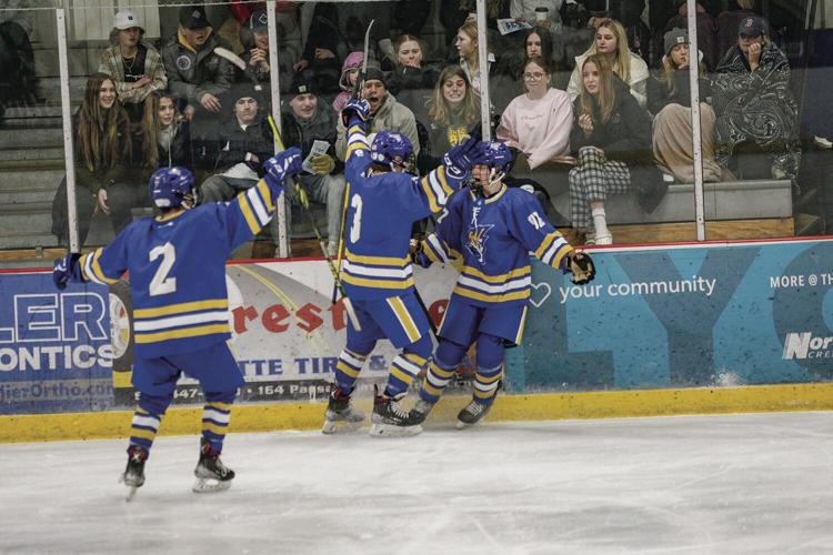 12-27-22 Peter Hall Xmas Tournament ice cats celebration after heath 1