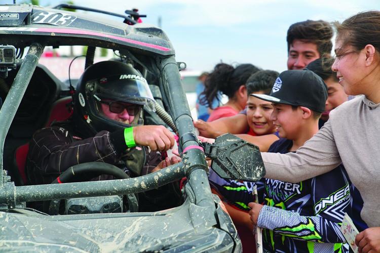 Baja handing out stickers.jpg