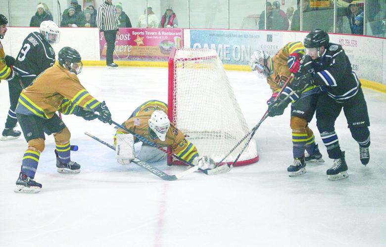 03-29-25 Battle Badges medium covering puck