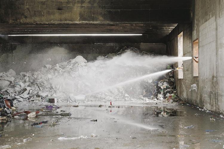 06-09-21 Transfer Station Fire spraying trash tighter