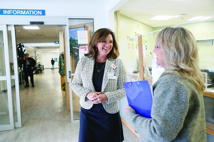 03-25-25 Tricia Costigan lobby chatting wider