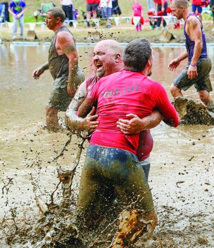 09-07-25 Mud Bowl hug after win vertical