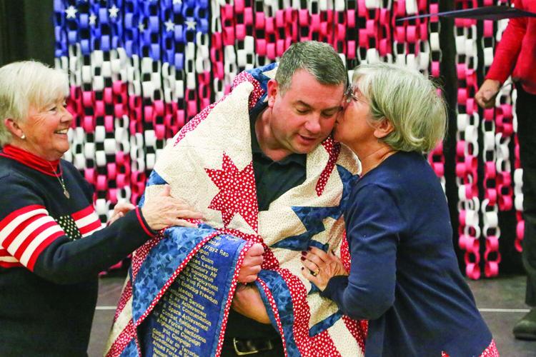 11-09-25 Quilts of Valor girouard kiss from mom