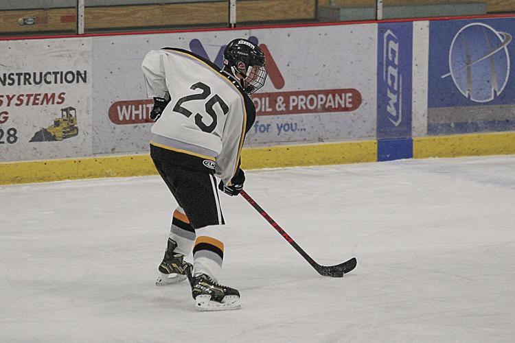 12-07-22 KHS Hockey wiggin side