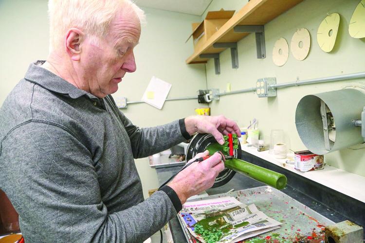 12-10-25 Hildebran Designs putting on tree medium