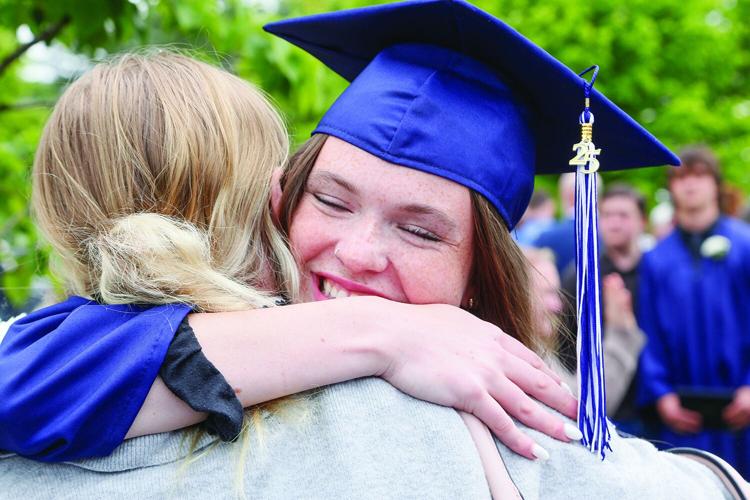 05-31-25 FA Graduation hug tight