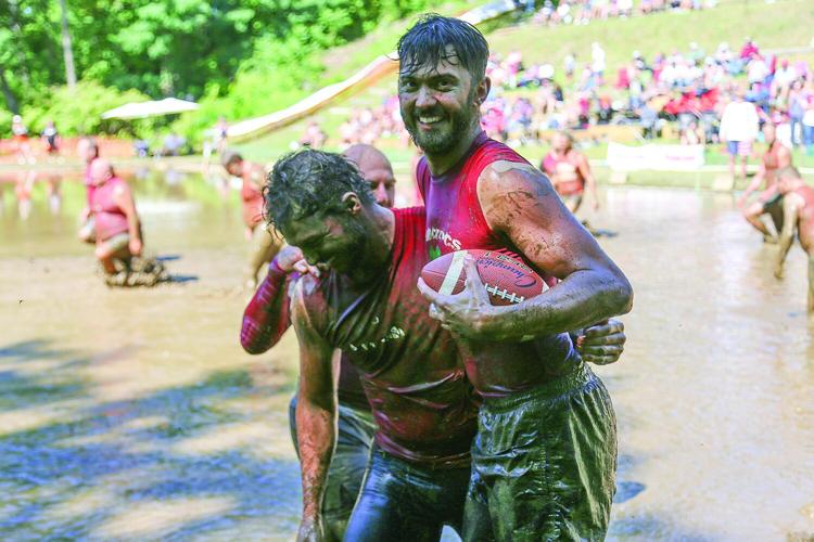 09-12-26 Mud Bowl crocs hug 2