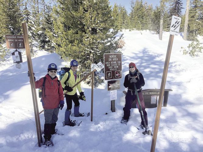 Nordic Trails - setting up signs along the trails