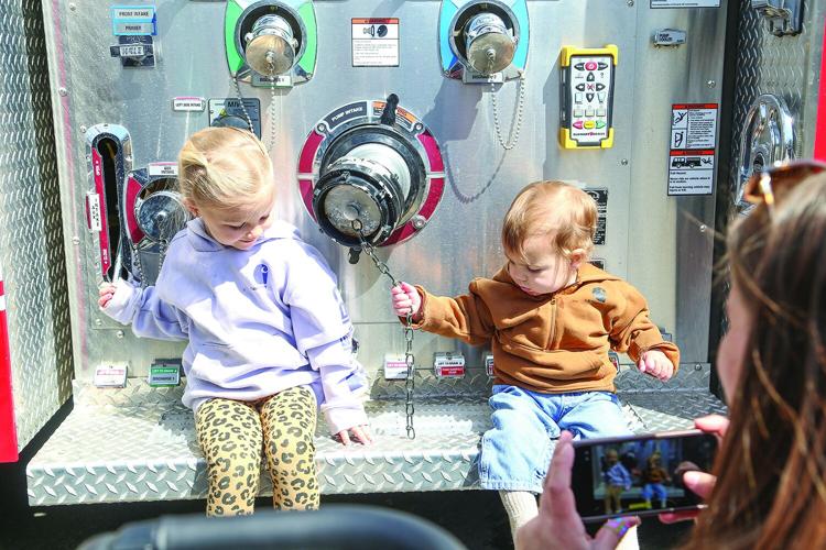 04-21-26 Touch-A-Truck siblings pic