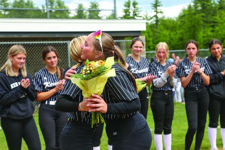05-31-26 KHS SB seniors liebenow hug teammate