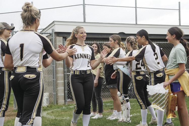 05-28-22 KHS SB seniors high fives higgins